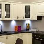 Modern Kitchen Remodel and Design with Linoleum Countertops and Wooden Cabinets